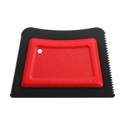 Serrated edge of the black pet hair remover pad with red grip